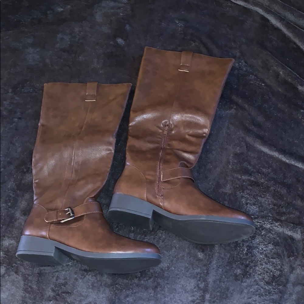 Never worn   Brown leather boots